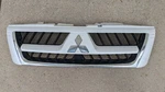 2003 - 2006 Mitsubishi Montero Front Upper Grill White Oem. Fixed Price $159.00.