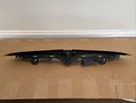 2021-25 Tesla Model Front Bumper Badge Carrier Center Support Bracket Oem. Fixed Price $149.00.