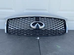 2015-2017 Infiniti QX80 Front Bumper Grille W/ Camera Hole 62310-5ZA0A Oem. Fixed Price $250.00.