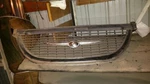 Grille Fits 98-00 Town & Country 293553. Fixed Price $97.03.