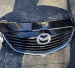 2013-2015 Mazda CX-9 Factory Upper Grille Black Horizontal Bars. Fixed Price $260.00.