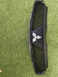 Emblem Front Bumper Cover Mesh For Mitsubishi Eclipse 09 10 11 12. Fixed Price $139.00.