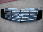 Cadillac Grille 25778367. Fixed Price $382.50.