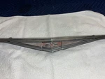 1965-69 Chevrolet Corvair Front Nose Emblem Trim Molding Badge 9703057. Fixed Price $45.00.