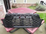Mint 2025-2026 Dodge Ram 1500 Only Radiator Grille Gloss Black Genuine 68565900A. Fixed Price $674.25.