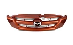 2005-2006 Mazda Tribute Front Upper Grille Trim Assembly Orange Oem. Fixed Price $97.97.