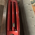 2005-2009 Land Rover Grille LR3 Front Center Upper Red Color Decoma DBH000273XXX. Fixed Price $120.00.