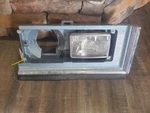1975 Cadillac Fleetwood Deville Headlight Bezel Housing, PN#1605166. Fixed Price $100.00.