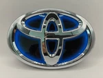 Genuine Oem Front Grille Emblem Logo Blue/silver Toyota Prius Hybrid 75310-47010. Fixed Price $39.99.