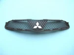 09 10 11 12 Mitsubishi Eclipse Front Bumper Cover Upper Top Grille Logo Used #2. Fixed Price $165.00.