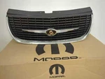 New Oem Genuine Chrysler Front Grille 1996-2000 Sebring Convertible 05288605AB. Fixed Price $155.00.