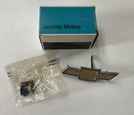 Nos Gm 1980 Chevrolet Nova Grill Center Bowtie Emblem 14002371 P6. Fixed Price $49.95.