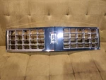 1984-1985 Oldsmobile Delta 88 Grille Chrome Piece Oem. Fixed Price $359.96.