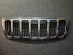 Grille Surround Chrome Fits 04 Grand Cherokee. Fixed Price $85.00.