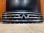Infiniti X35 Front Grille Oem 62310-CG000 (fits 03-05). Fixed Price $100.00.