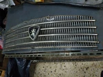 Peugeot 404 Central Mask - Grille De Calandre 780929. Fixed Price $330.00.