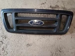 04-08 Ford F150 Front Upper Honeycomb Grill Used Oem 4L34-8200-JBW. Fixed Price $220.00.