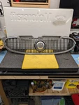04-07 Buick Rainier Front Upper Bumper Grille W/ Emblem Badge. Fixed Price $175.00.