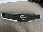 2012 Nissan Sentra Front Bumper Grille 62070-ZT50A Oem. Fixed Price $75.00.