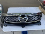2010-2012 Mazda CX-9 CX9 Front Upper Center Radiator Grille W/ Emblem Oem. Fixed Price $250.00.