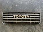 Toyota Land Cruiser Oem FJ60 Grille With Emblem 1986 Original 53111-90A00. Fixed Price $90.00.