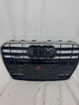 Audi A4 Quattro Front Center Grille Assembly 8T0853651K/8T0853651L. Fixed Price $69.99.