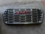 2025-2026 Gmc Yukon Denali Front Radiator Grille And Hood Trim Oem 84956262. Fixed Price $400.00.