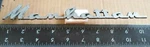 Kaiser Manhattan Circa '54 Metal Script Emblem 792754 2771. Fixed Price $90.00.
