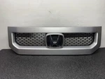 Honda Element 2009-2011 Upper Center Front Grille (75100-SCV-A510) Oem. Fixed Price $159.00.