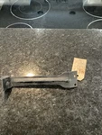 Nos 1953 Chevy Grille Support Bracket 3702500. Fixed Price $25.00.